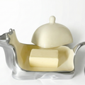 Butter dish with a lid on a white background