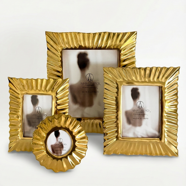 Set of gold picture frames on a white background
